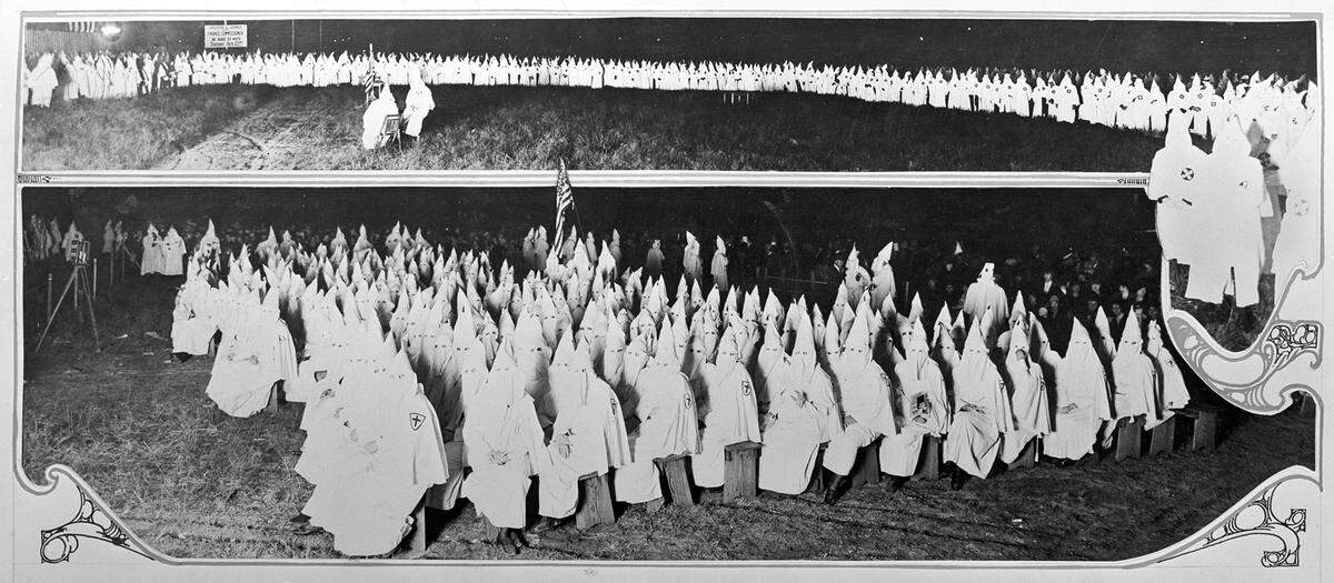 A 1923 Ku Klux Klan gathering in Fort Worth, including a campaign sign in the background for Finance Commissioner Chester L. Jones.
