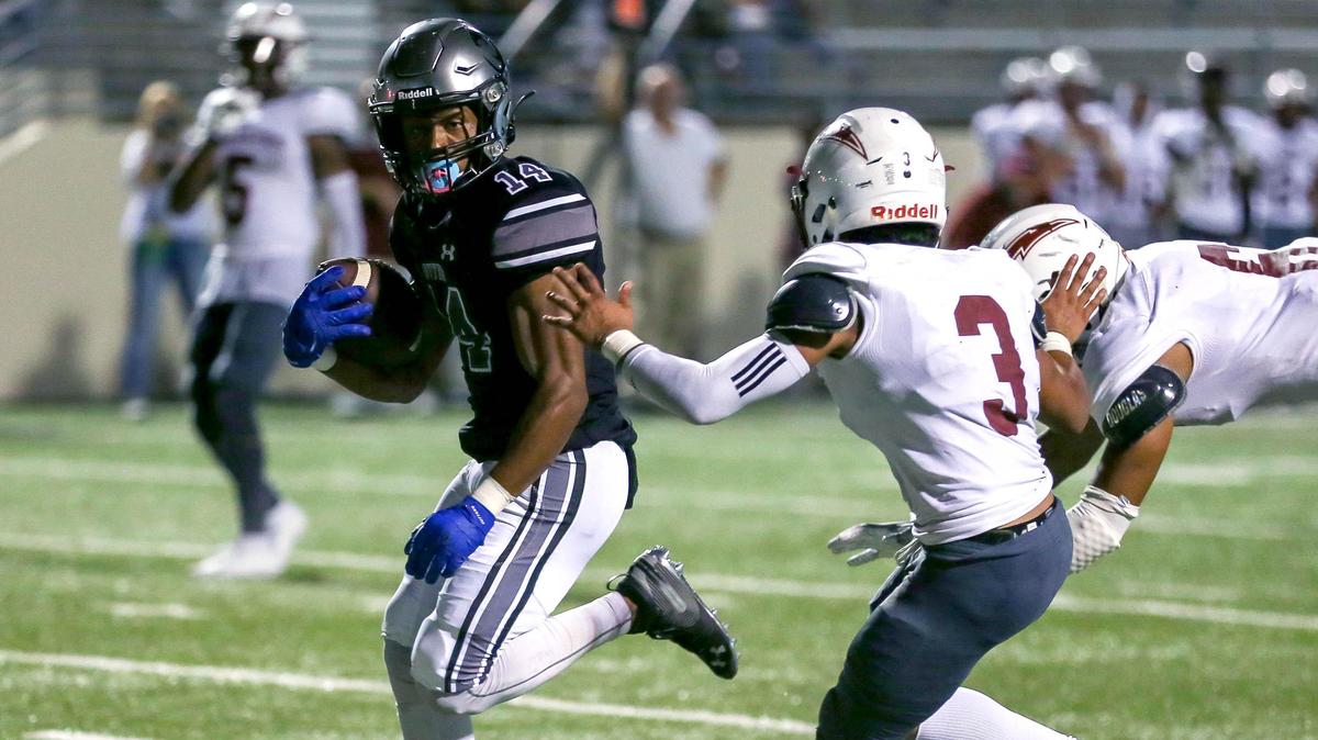Denton Guyer wide receiver Travis Romar (14) goes in for a 28 yard touchdown reception against Keller Central during the second half, Thursday night, September 26, 2019 played at C.H. Collins Complex Stadium in Denton,