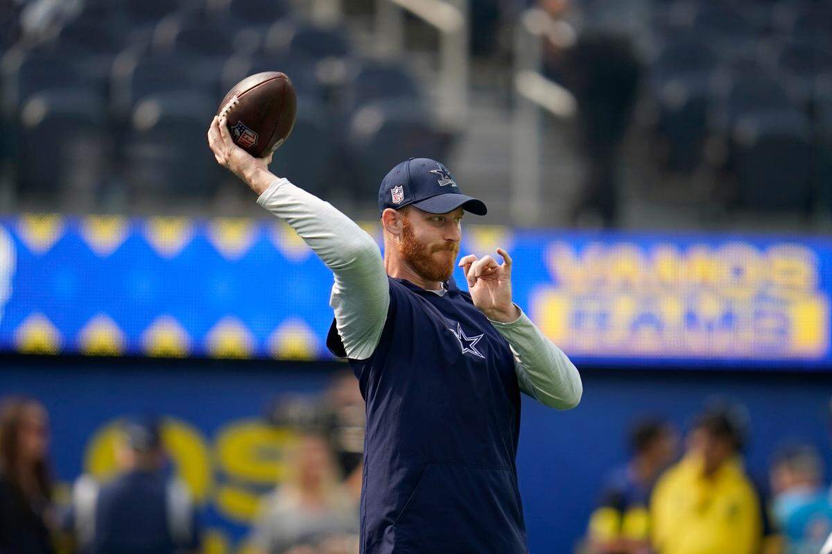 Dallas Cowboys quarterback Cooper Rush warms up before an NFL football game against the Los Angeles Rams, Sunday, Oct. 9, 2022, in Inglewood, Calif.