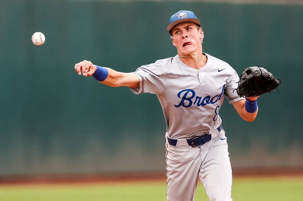 Brock shortstop Canon Lightfoot (8) throws the ball to make a play to first against Robinson in the UIL Class 4A Division II baseball state championship game on Friday, June 5, 2026, at Dell Diamond in Round Rock, Texas.