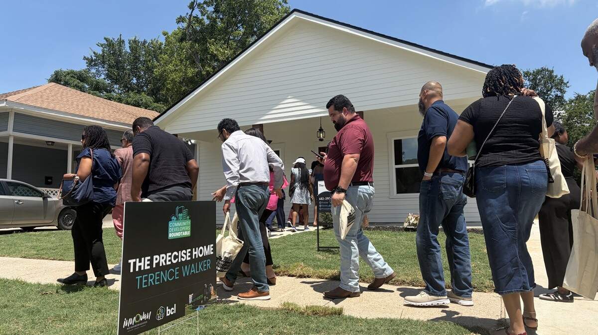 Members and alumni of the Community Developers Roundtable enter into Terence Walker’s development on Stella Street. The Community Developers Roundtable supports developers in creating affordable housing, access to capital, and revitalizing underserved neighborhoods in the Dallas-Fort Worth area.