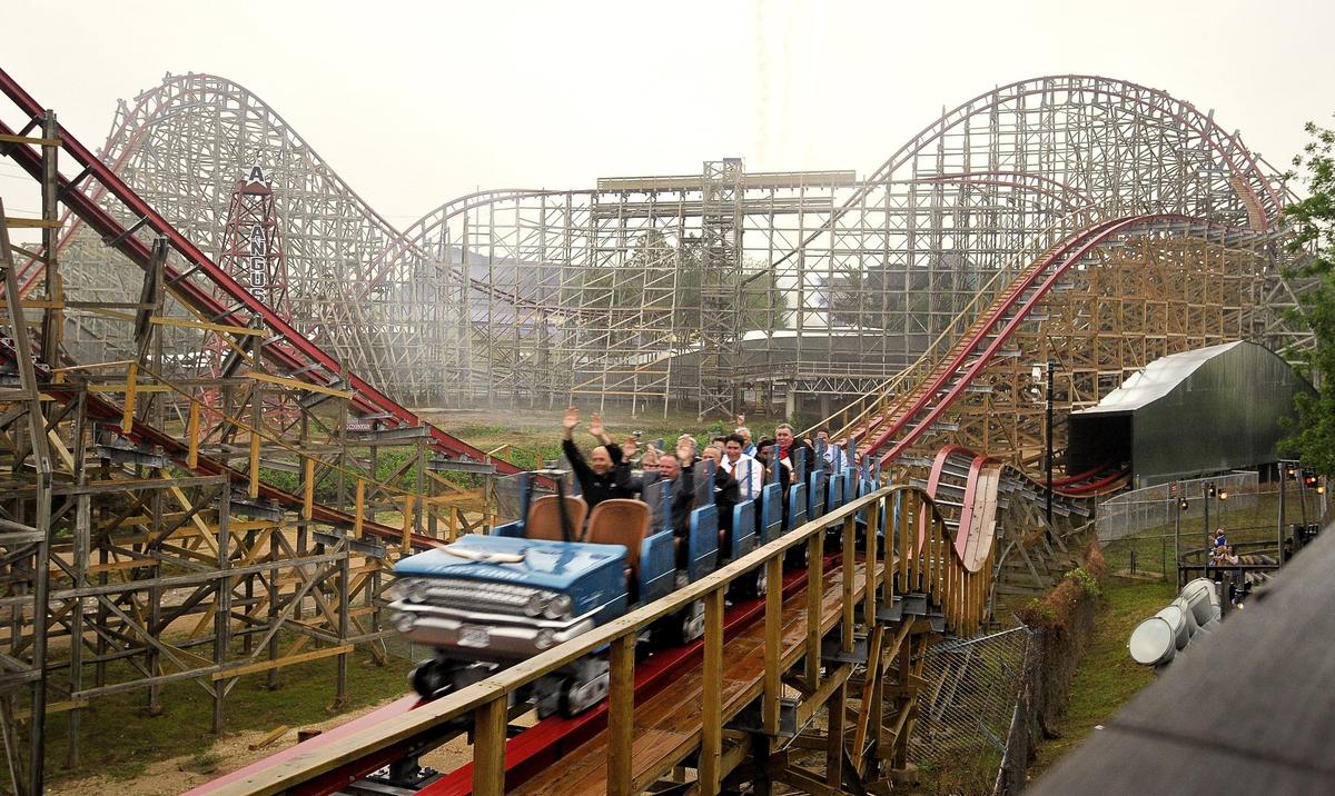 April 21, 2011: Roller coster fans ride the new and improved steel and wood super hybrid coaster at Six Flags Over Texas in Arlington.