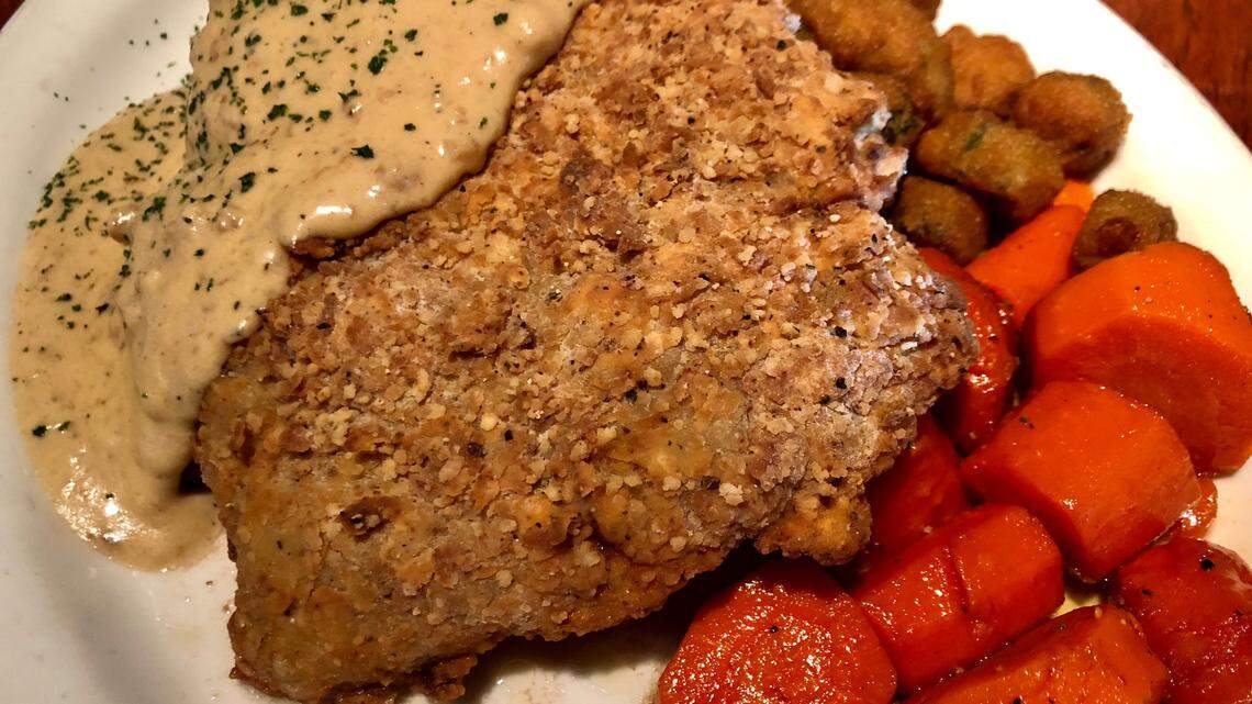 Chicken-fried steak with carrots and okra at Charleston’s.