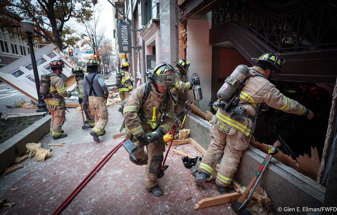 Fort Worth firefighters respond to an explosion, believed to be caused by a gas leak, at the Sandman Signature Hotel downtown on Monday, Jan. 8, 2024.