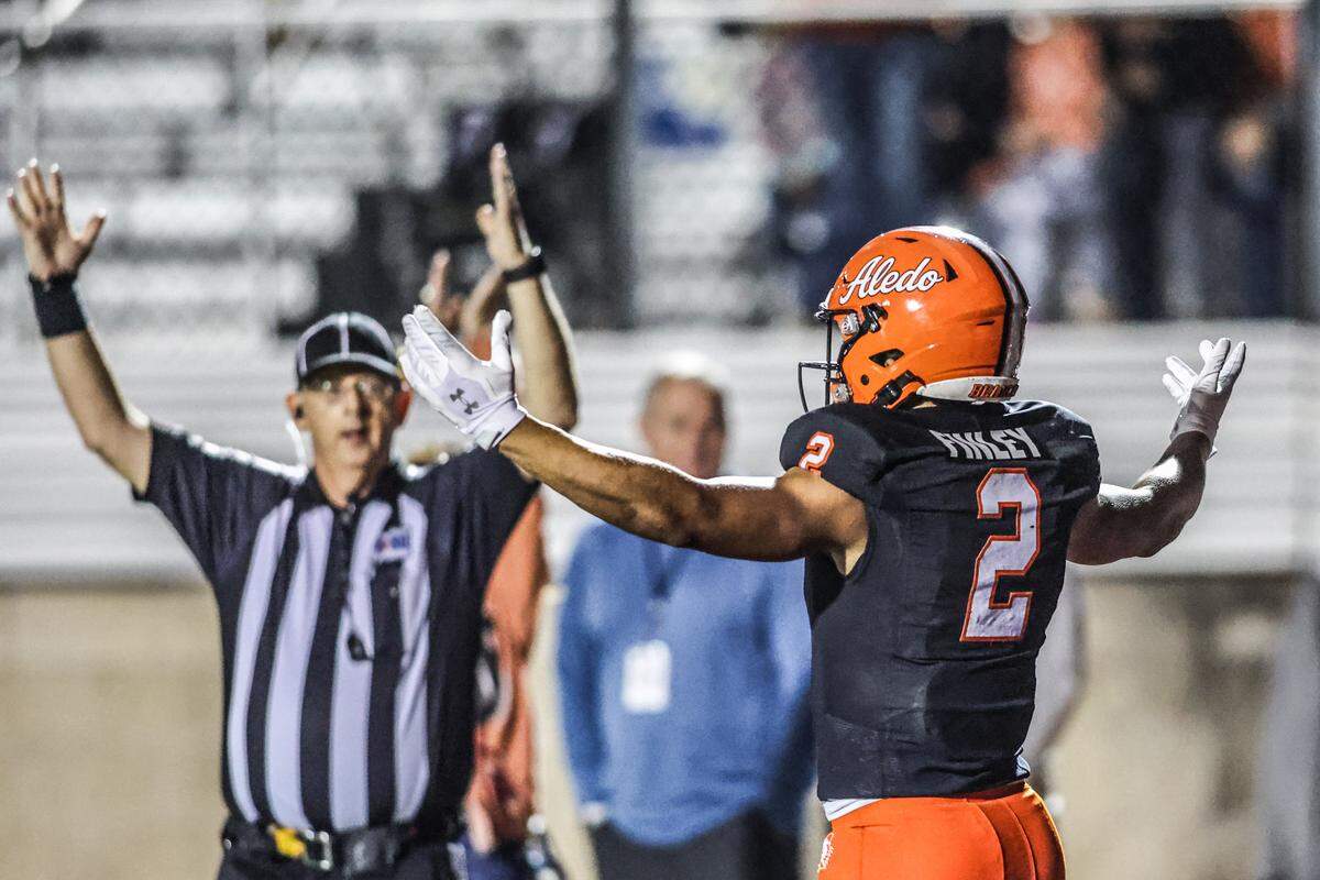 Aledo’s Kaydon Finley celebrates his touchdown reception against Saginaw in a Class 5A Division I bi-district playoff game Nov. 13 at Tim Buchanan Stadium in Aledo.