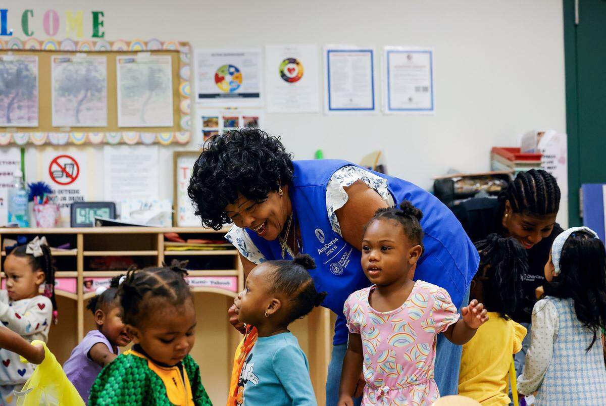 Wanda Fields, 75, interacts with children at the Early Head Start program at J.A. Hargrave Elementary School on Monday, Sept. 15, 2025, in Fort Worth. Fields spends 20 hours a week volunteering through the Texas Health and Human Services' Foster Grandparent program.