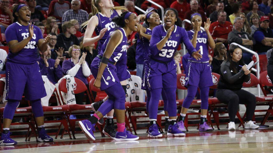 The TCU women's basketball team celebrates its 79-71 win Sunday night at South Dakota. The Horned Frogs advanced to their first WNIT semifinal game against Indiana.