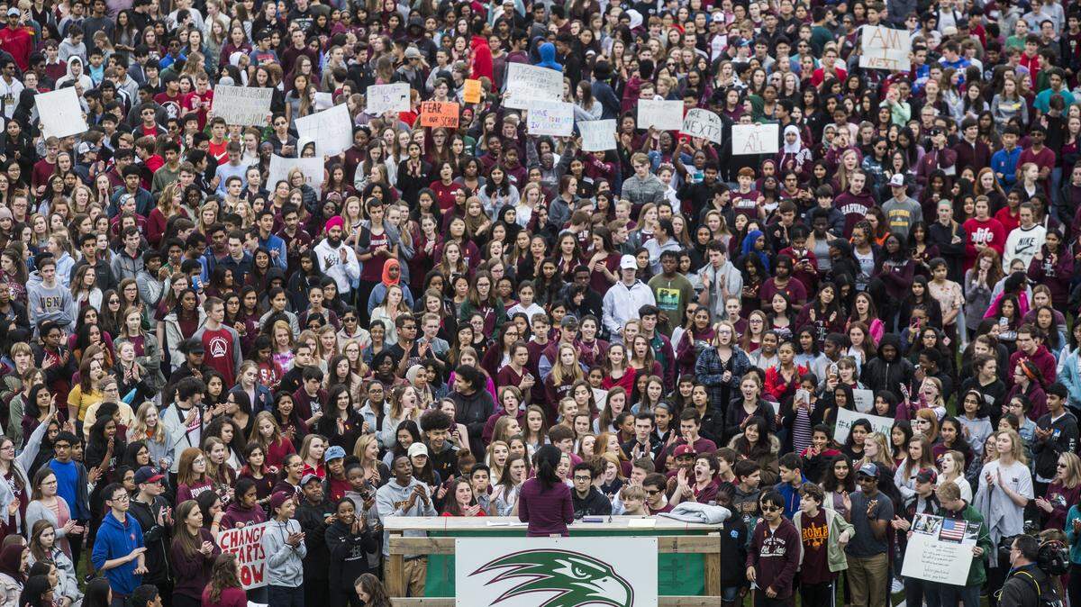 More than 2,000 students walked out of Green Hope High School in Cary, N.C. on Wednesday, Feb. 28, 2018 calling for political change to try to end school gun violence following the recent school shooting in Parkland, Florida. Students plan more school walkouts this week.