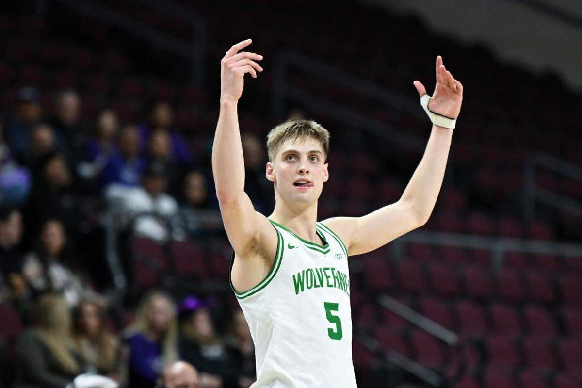 LAS VEGAS, NEVADA - MARCH 14: Tanner Toolson #5 of the Utah Valley Wolverines celebrates defeating the Seattle Redhawks 68-55 in the semifinal game of the Western Athletic Conference men's basketball tournament at the Orleans Arena on March 14, 2025 in Las Vegas, Nevada. (Photo by Candice Ward/Getty Images)