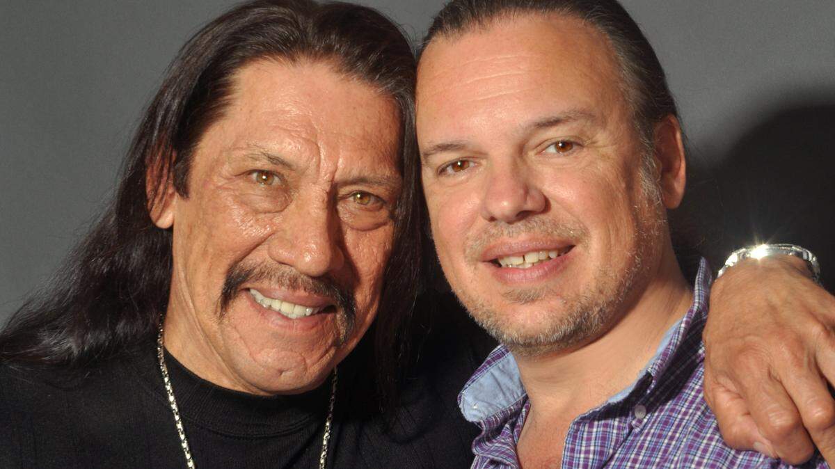 Alan Mercer, right, of Burleson has been photographing celebrities for more than two decades. Here he is pictured with his good friend, movie star Danny Trejo.
