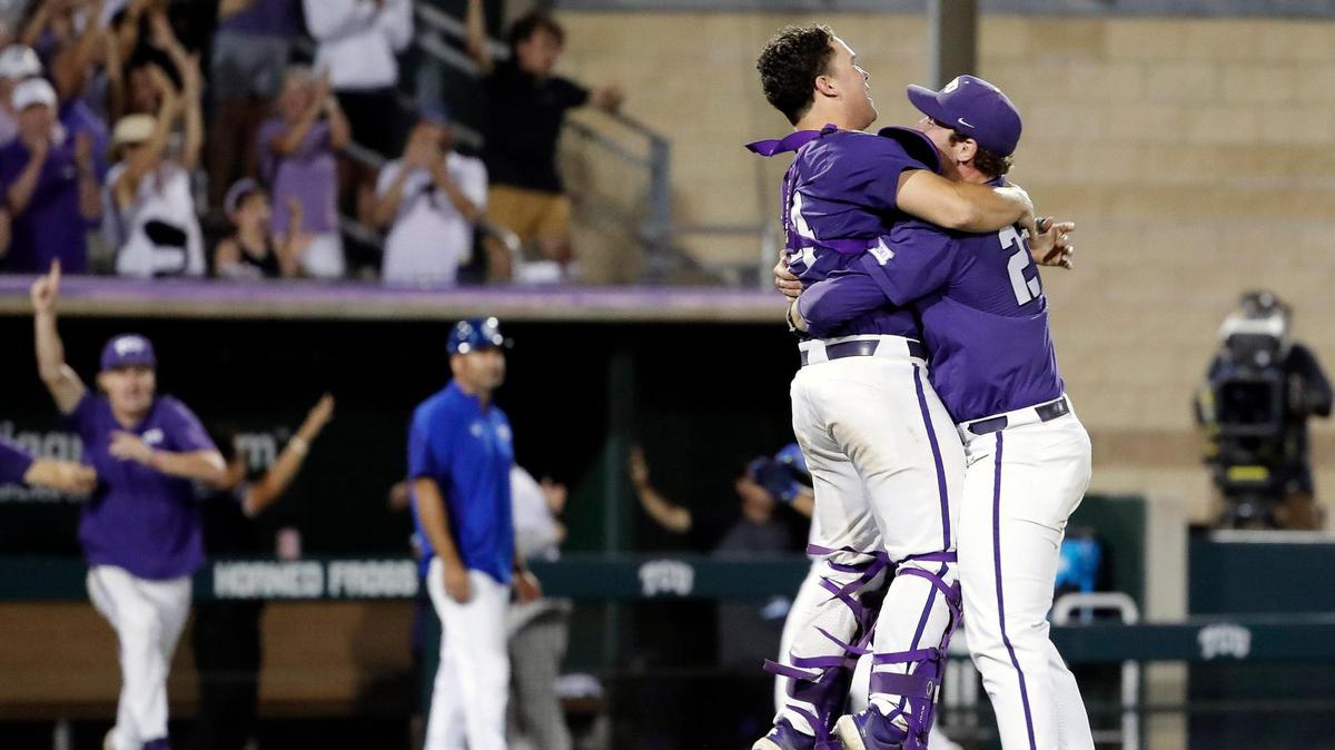TCU catcher Karson Bowen (14) and pitcher Garrett Wright (21) embrace after the Horned Frogs beat Indiana State to advance to the College World Series.