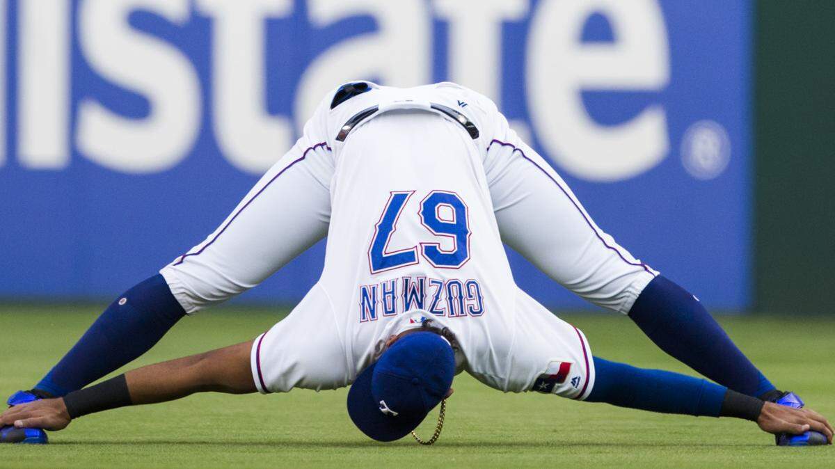 This is nothing for Ronald Guzman, who routinely and easily does the splits for the Texas Rangers at first base.