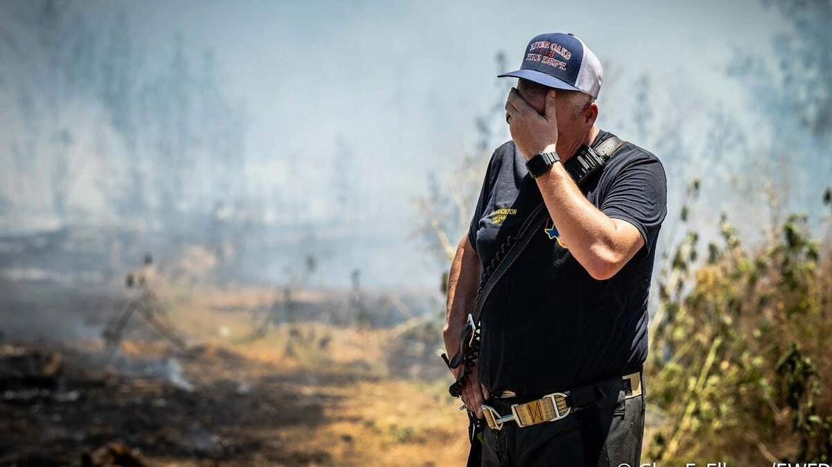 Fort Worth firefighters spent hours battling a large grass fire off Isbell Road on Wednesday afternoon, July 19, 2023.