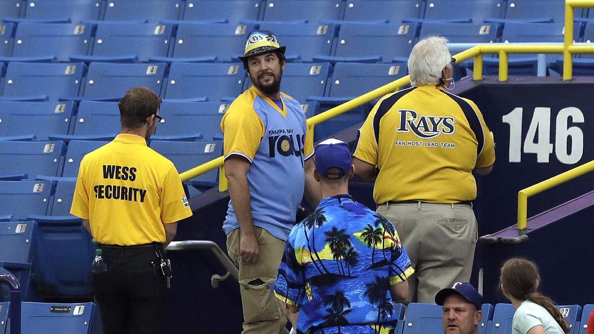 The fan who interfered with a potential Renato Nunez home run in the fourth inning Wednesday is removed from his seat at Tropicana Field.