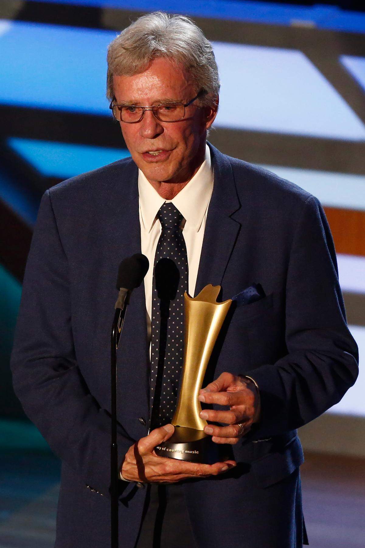 FILE - In this Aug. 23, 2017 file photo, Bob Kingsley accepts the Mae Boren Axton Service Award during the 11th annual ACM Honors at the Ryman Auditorium in Nashville, Tenn. (Wade Payne/Invision via AP, File)