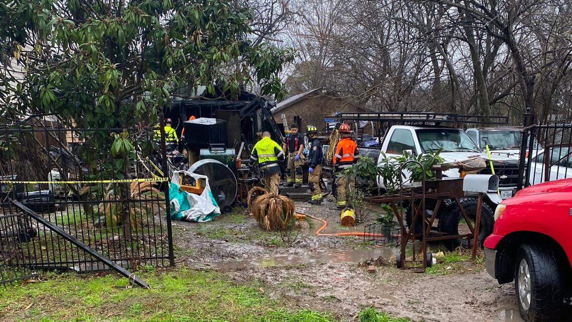 A Texas mother died while trying to save her infant son from a burning home in Houston, firefighters say.