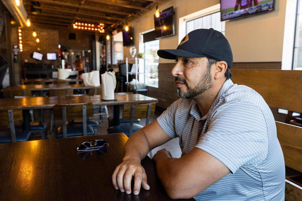 Rick Figueroa, owner of The Station Patio Icehouse, says the reconstruction project along Lamar Street had initially attracted him to start his business there Wednesday, April 13, 2022, in Keller.