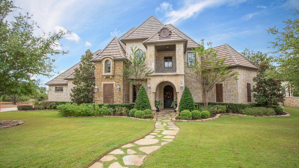 The chateau-style home at 9533 Marbella Drive is perfect for elegant entertaining.