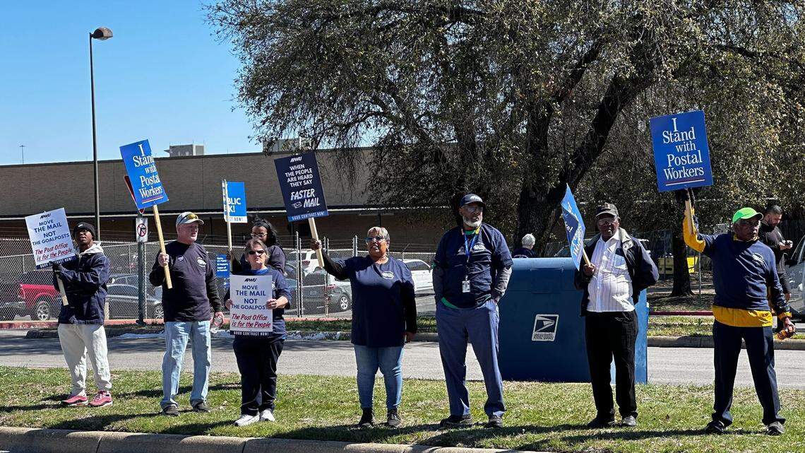 U.S. Postal Service workers protest in north Fort Worth on Thursday, March 20, 2025, in response to the Trump administration’s desire to privatize the post office or fold it into the Department of Commerce.