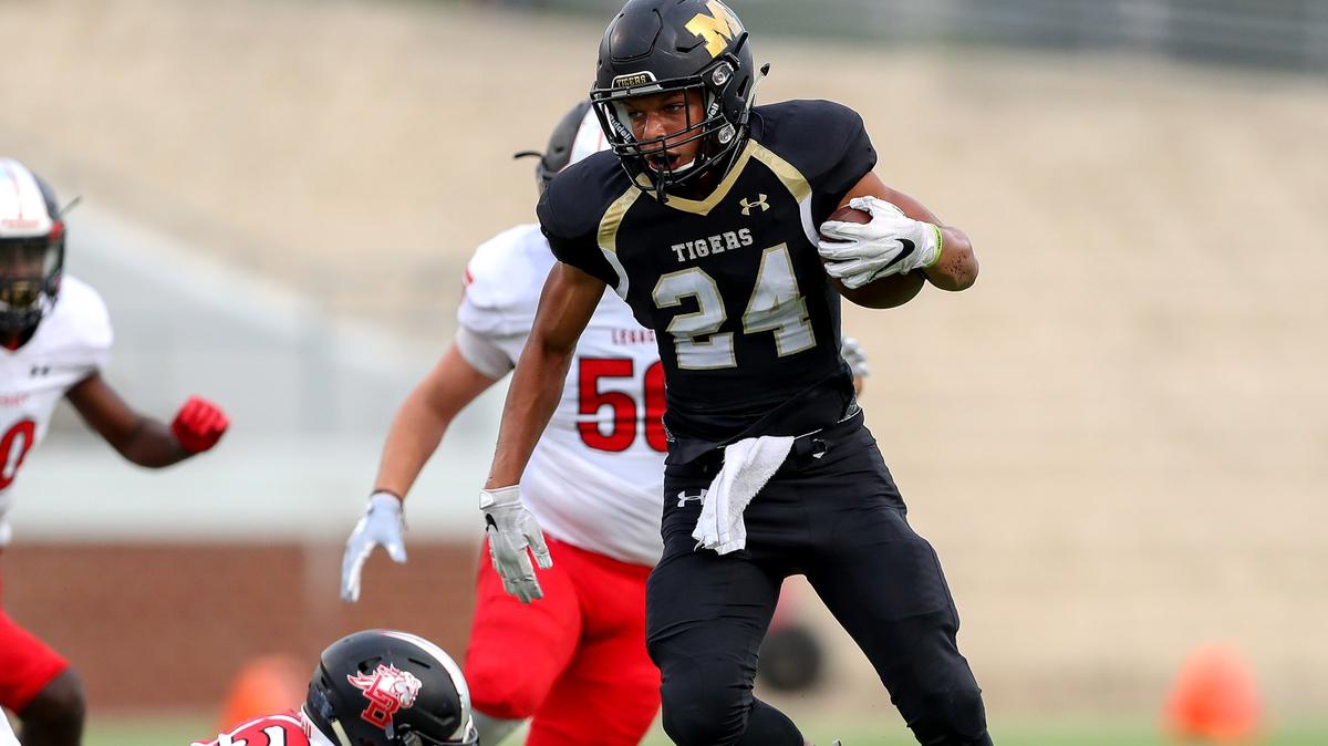 Mansfield running back Josh Littleberry (24) leads Mansfield rushing attack against Mansfield Legacy Friday night, played at Newsom Stadium, September 14, 2018 in Mansfield, TX.