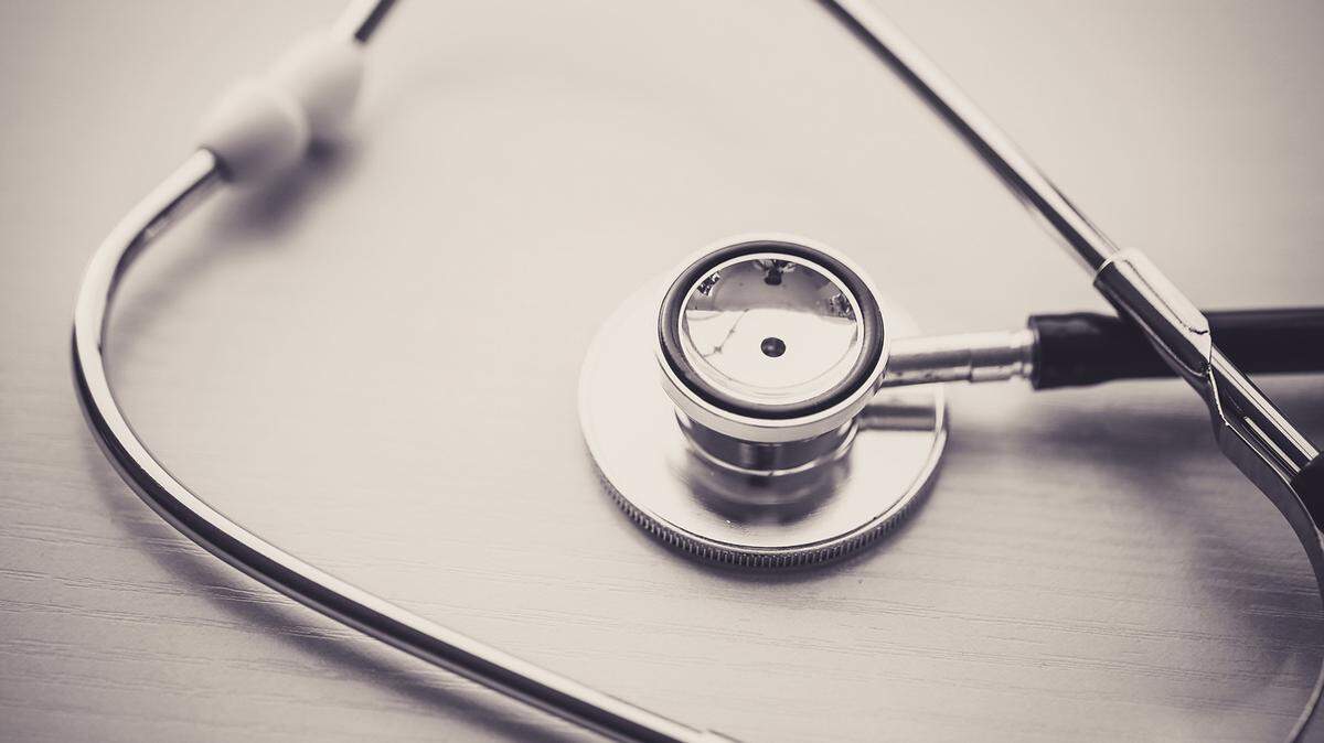A close-up shot of a stethoscope on a table.