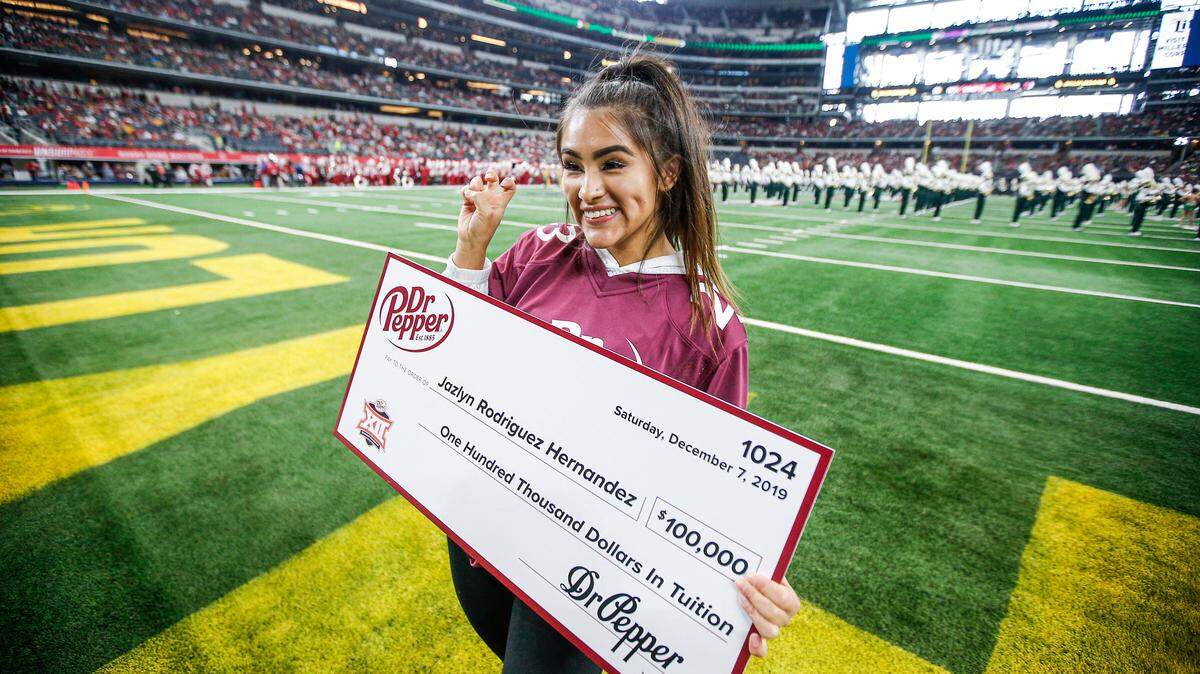 TCU student Jazlyn Rodriguez Hernandez won $100,000 in the Dr Pepper Tuition Giveaway challenge at halftime of the Big 12 Championship Game at AT&T Stadium in Arlington, Texas, Saturday, Dec. 7, 2019.