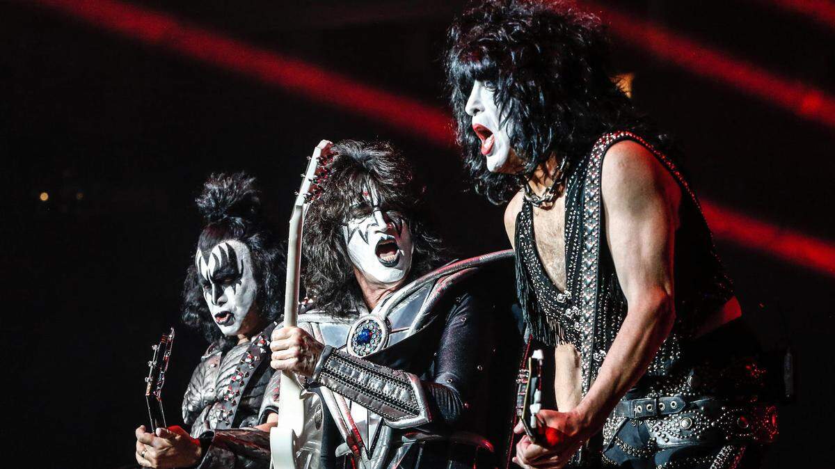Gene Simmons, left, Tommy Thayer, middle, and Paul Stanley, of the band Kiss, played a hits-filled, two-hour show Friday at a mostly filled Dickies Arena in Fort Worth in 2021.