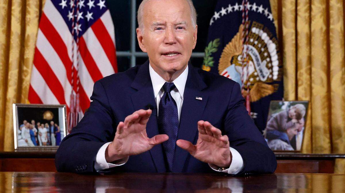President Joe Biden addresses the nation on the conflict between Israel and Gaza and the Russian invasion of Ukraine from the Oval Office of the White House in Washington, D.C., on Thursday, Oct. 19, 2023. (Jonathan Ernst/Pool/AFP/Getty Images/TNS)