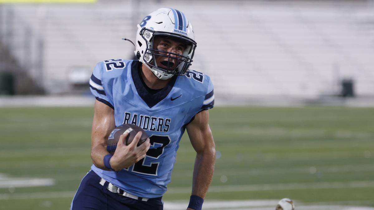 L.D. Bell running back Brendon Gleim (22) takes off on a 37 yard touchdown run during the first half of a UIL football game between Keller and L.D. Bell at Pennington Field in Bedford, Texas, Friday, Sept. 19, 2025.