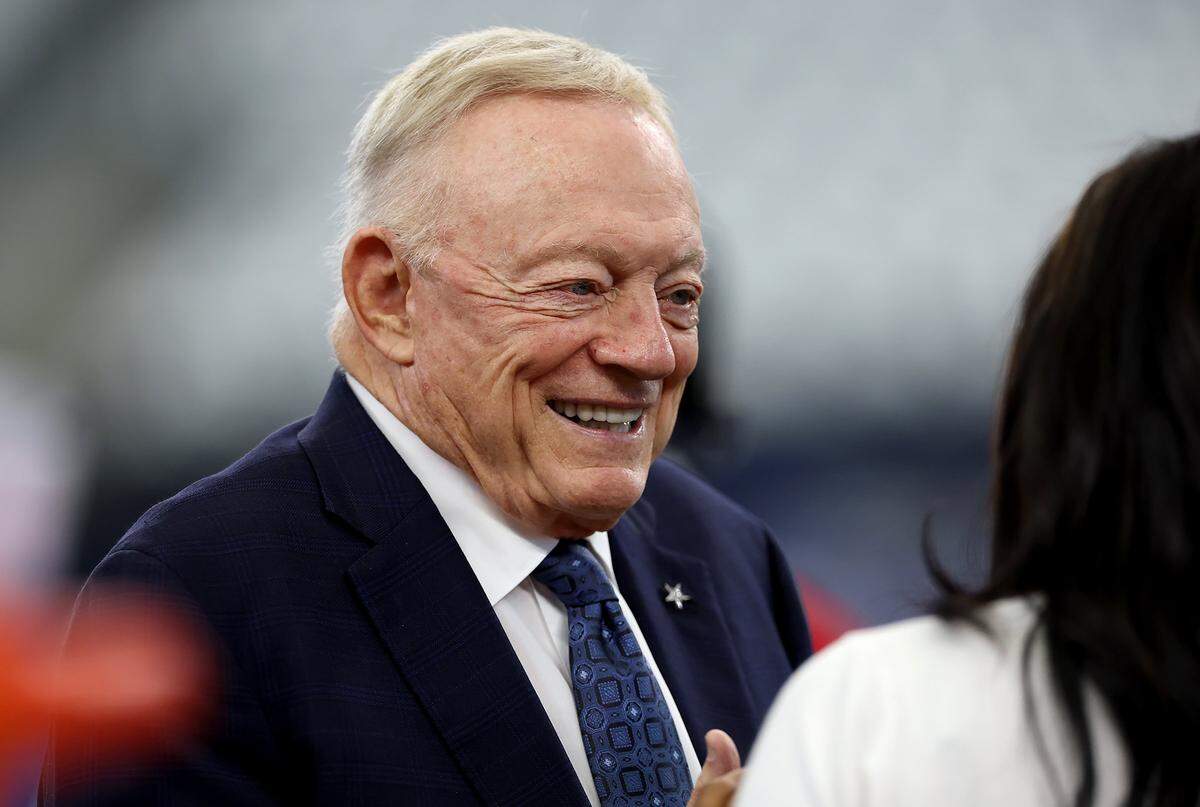 Jerry Jones talks to reporters prior to the start of the Dallas Cowboys' season home opener against the New York Giants on Sunday, Sept. 14, 2025, at AT&T Stadium in Arlington.