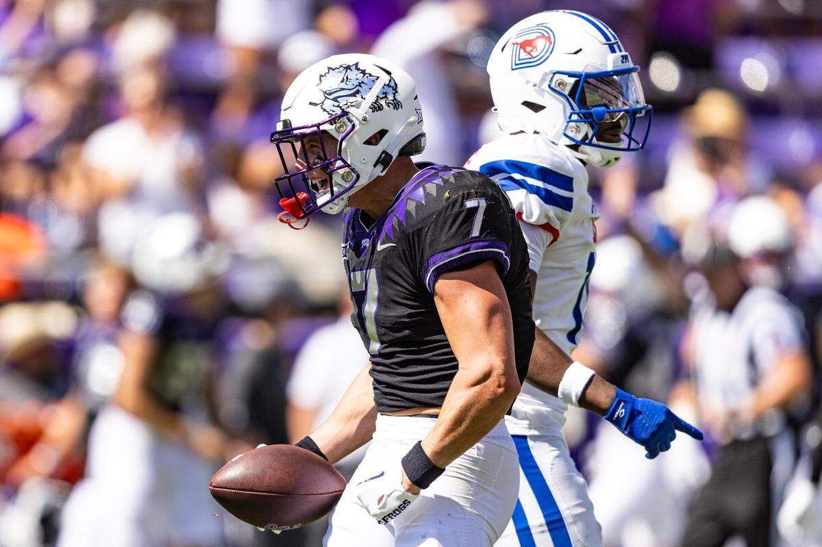 TCU wide receiver JP Richardson (7) celebrates after catching a pass in the first half of a college football game between the TCU Horned Frogs and the SMU Mustangs at Amon G. Carter Stadium in Fort Worth on Saturday, Sept. 23, 2023.