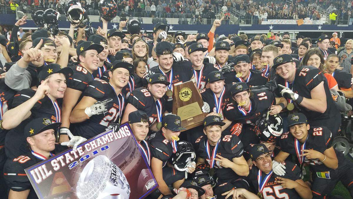 Aledo’s No. 99 Blaze Mayes front and center for the team picture celebrating the school’s 8th state title.