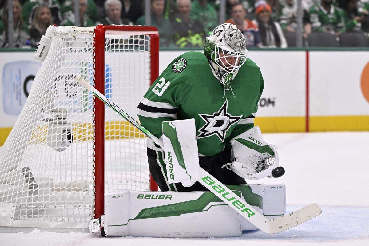 Dallas Stars goaltender Jake Oettinger (29) makes a save against the Edmonton Oilers in the first period during game one of the Western Conference Final of the 2025 Stanley Cup Playoffs at American Airlines Center.  