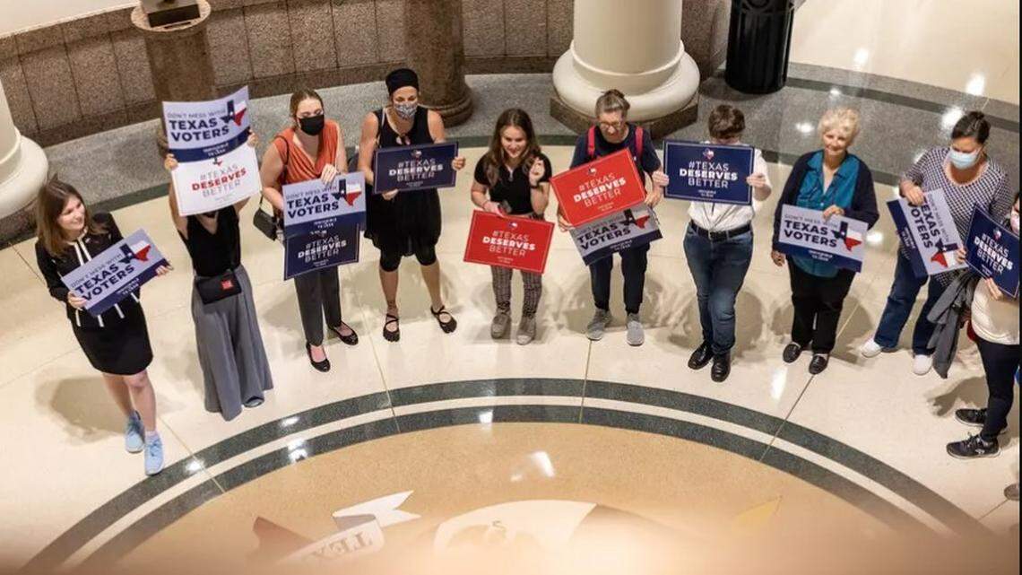 Activists gather outside a Texas Senate committee hearing on proposed election reforms at the Capitol on Saturday, July 10, 2021. 