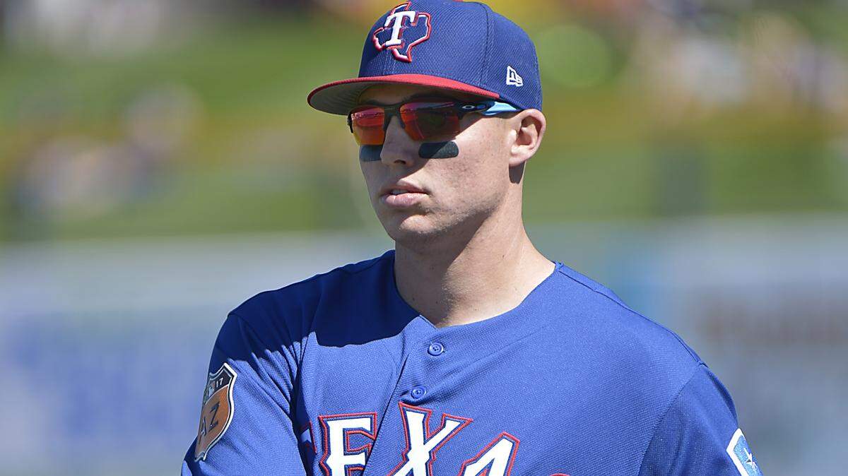 Drew Robinson is one of the two outfielders left in camp who might be walking on egg shells.