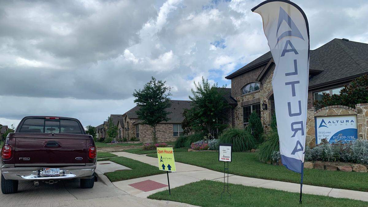 An Altura Homes model home in Red Oak on the southern end of Dallas-Fort Worth. The builder has sent letters to 164 owners with purchasing contracts warning them that the costs of their houses may go beyond the original agreed-upon amount.