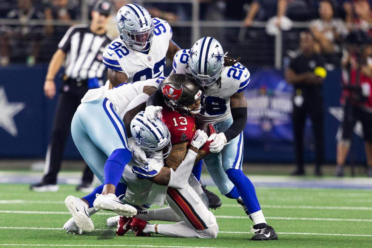 Dallas Cowboys defense tackle Buccaneers Mike Evans during the second half of the game against Tampa Bay Buccaneers Sunday, Sept. 11, 2022, at AT&T Stadium in Arlington.