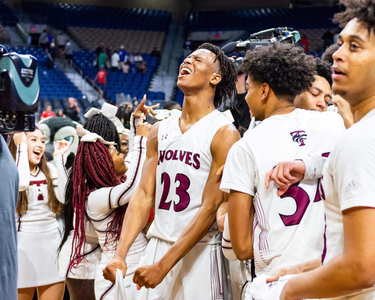 Timberview senior Trazarien White celebrates the 5A title over Wagner, Saturday March 9, 2019.