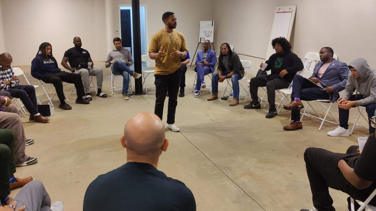 Robert Griffin Jr., director of Housing Advocacy, leads an event for CommUnity Frontline.