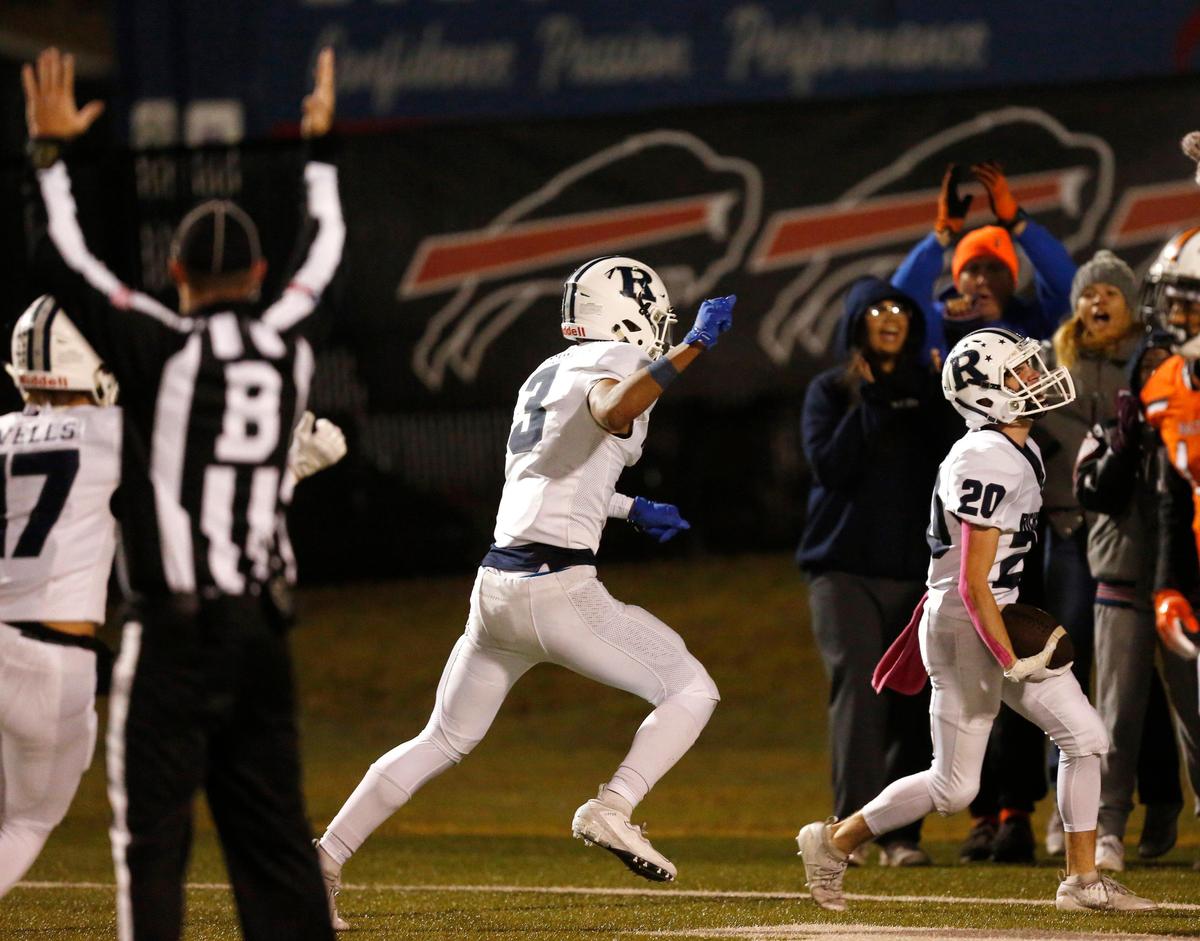 The back judge signals Richland’s Slade Hamilton (20 touchdown in the second quarter as C.J. Baskerville (3) celebrates. The Richland Rebels played the Haltom Buffalos at Birdville FAAC stadium in North Richland Hills Friday, October 25, 2019.