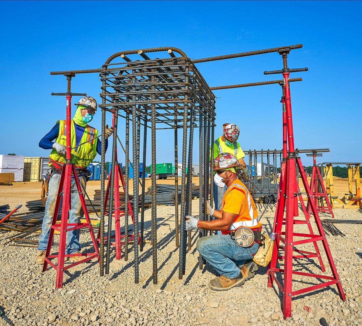 Workers build a battery plant last year in Lordstown, Ohio. General Motors, in a joint venture with LG Chem, will mass-produce Ultium battery cells for electric vehicles and create more than 1,100 new jobs in Ohio.
