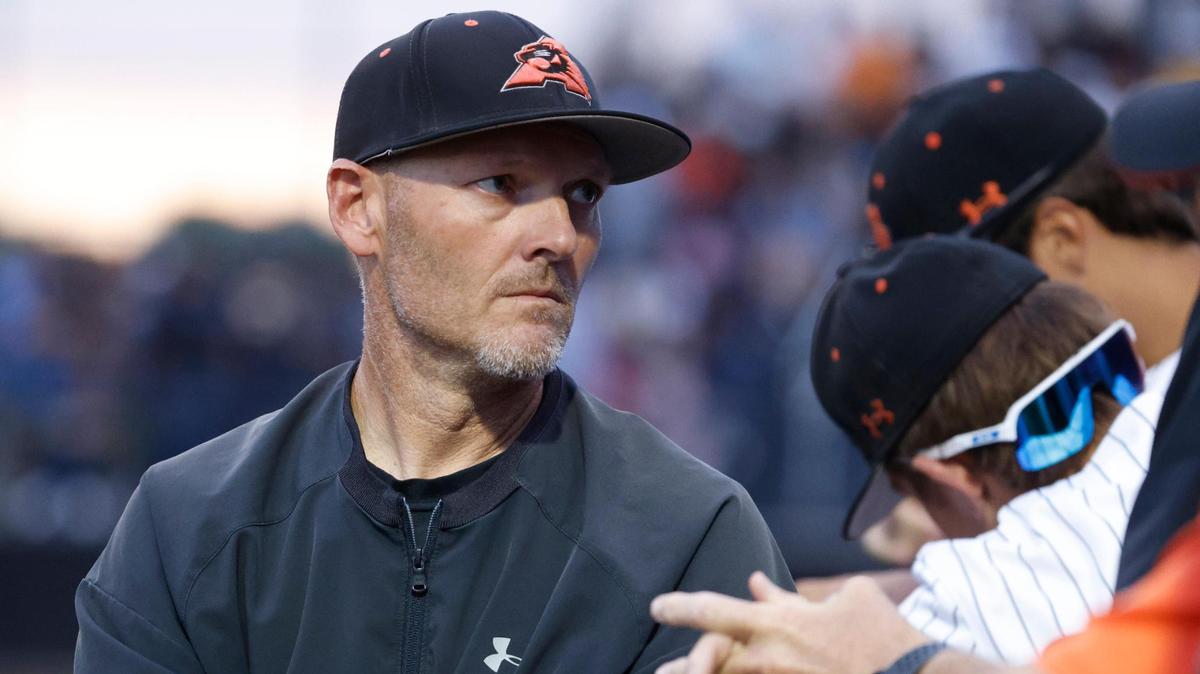 Aledo head coach Chad Barry talks to players in the dugout during a UIL Area Round 5AD1 baseball playoff game at Bearcat Field in Aledo, Texas, Thursday, May 08, 2025.