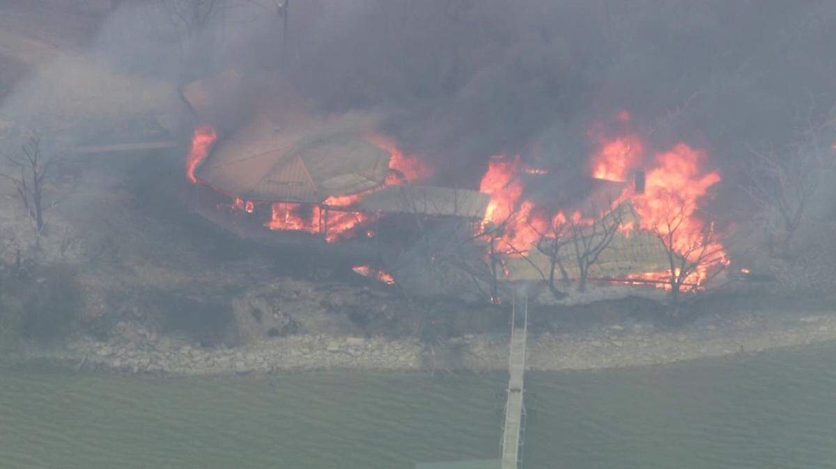 A fire near Possum Kingdom Lake in Palo Pinto County has burned more than 500 acres as of Tuesday morning, officials said.
