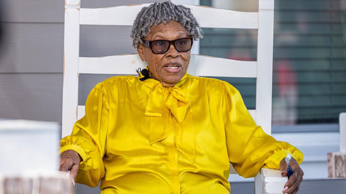 Opal Lee, who’s known as the grandmother of Juneteenth, sits on her new porch for a celebration to commemorate the opening of her new house at Historic Southside in Fort Worth on Friday, June 14, 2024. The home sits on the same property where white rioters forced her family out of when she was 12 on June 19th, 1939.