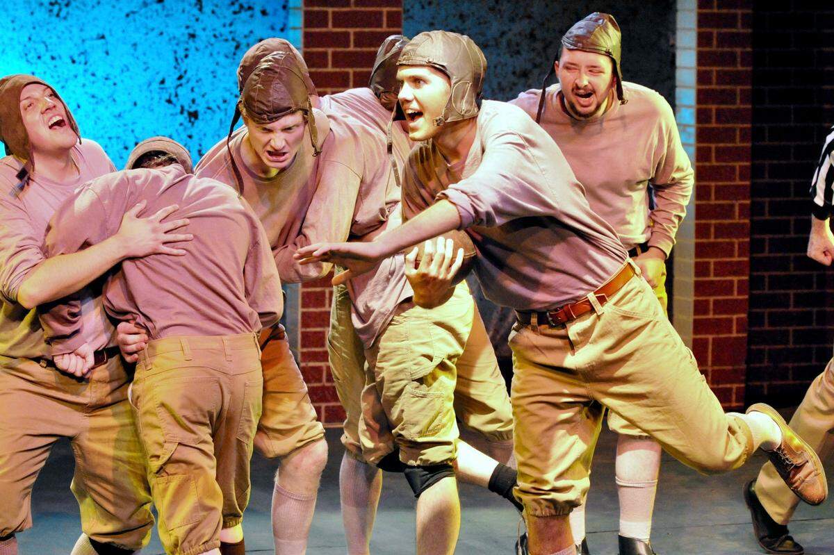 Fort Worth product Bo McMillin (Cody Rees, center) leading Centre College to victory in “The Wonder Team” a play about the legendary Centre College Praying Colonels football team.