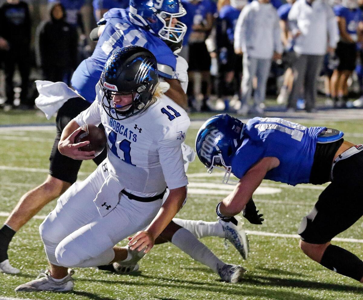 Byron Nelson quarterback Jacob Wilson (11) goes in for their second touchdown in a 6A Division 2 bi-district football playoff game at Kangaroo Stadium in Weatherford, Texas, Friday Nov. 12, 2021. Byron Nelson led 21-7 at the half. (Special to the Star-Telegram Bob Booth)