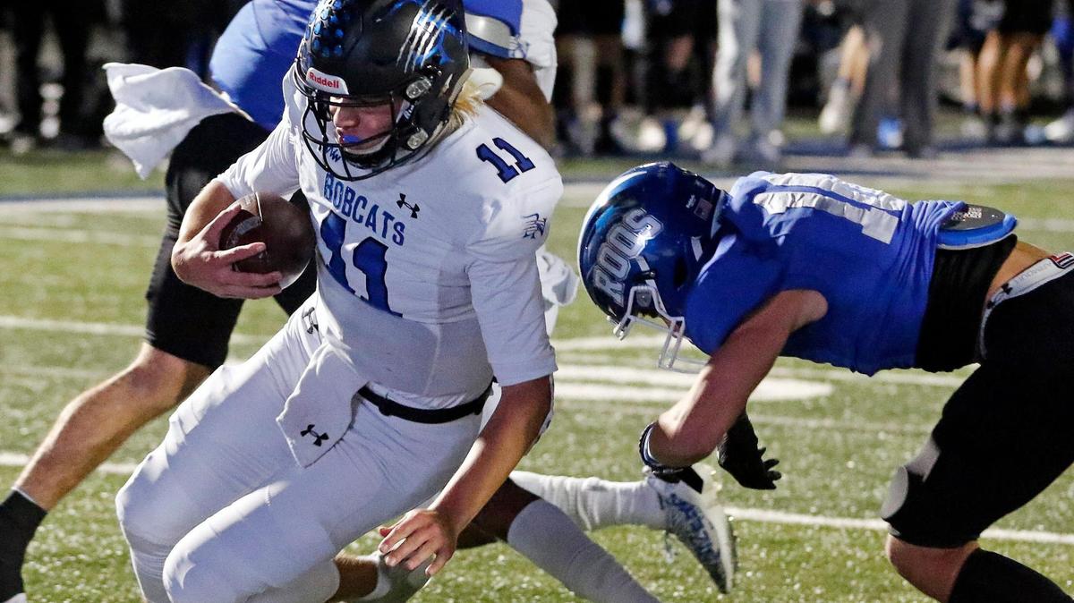 Byron Nelson quarterback Jacob Wilson (11) goes in for their second touchdown in a 6A Division 2 bi-district football playoff game at Kangaroo Stadium in Weatherford, Texas, Friday Nov. 12, 2021. Byron Nelson led 21-7 at the half. (Special to the Star-Telegram Bob Booth)