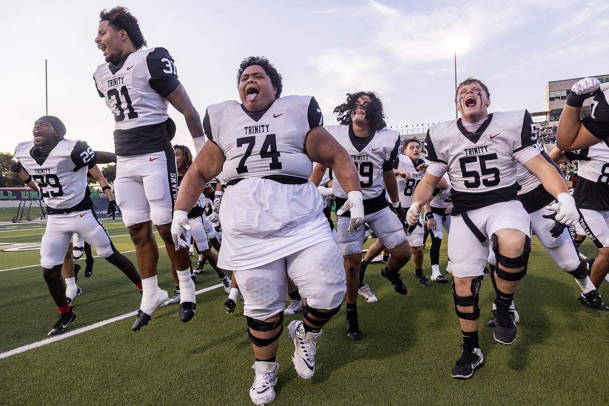 Members of the Euless-Trinity football team participate in their pregame ceremonial Sipi Tau prior to a high school game between Southlake Carroll and Euless-Trinity at Dragon Stadium in Southlake on Friday, Sept. 19, 2025.