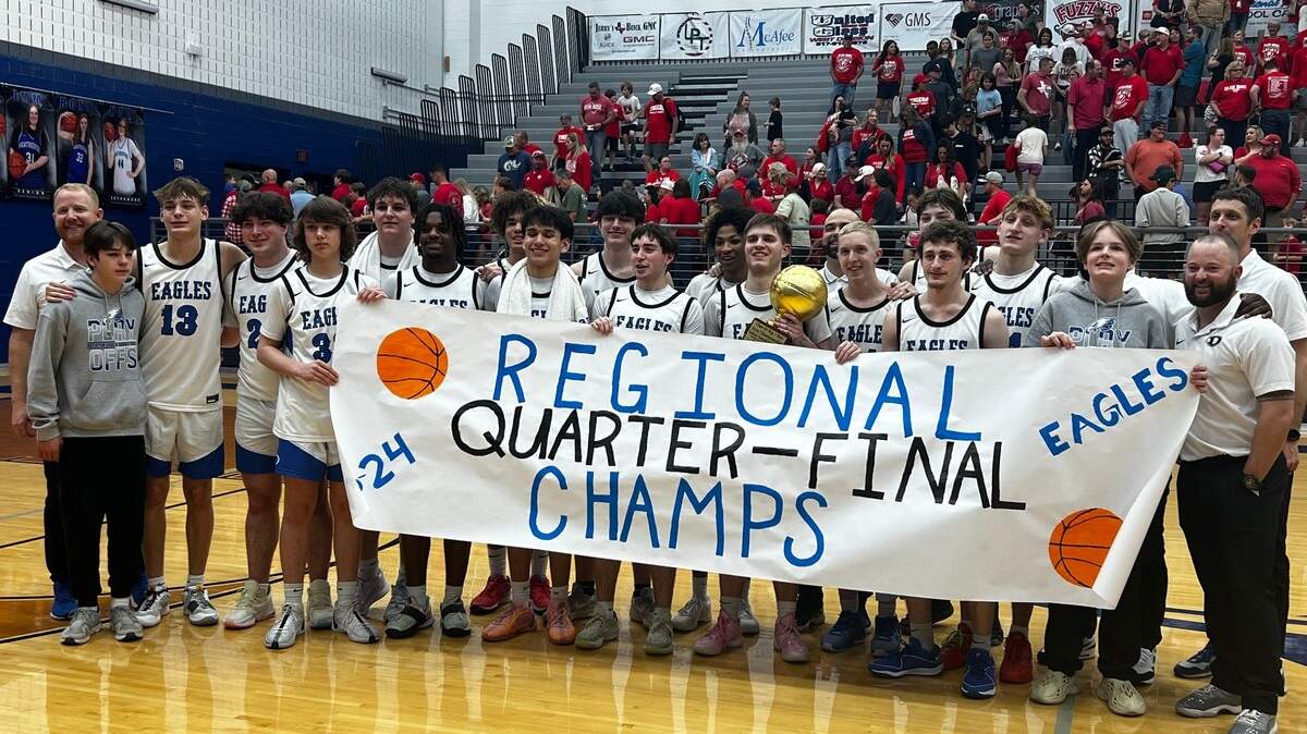 Decatur boys basketball celebrates winning a Class 4A regional quarterfinal game against Glen Rose at Weatherford High School on Feb. 26, 2024.
