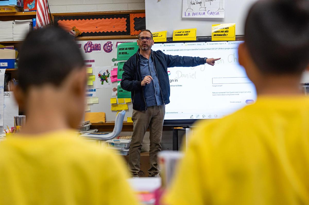 Bilingual teacher Miguel Fijó Mezquita interacts with his students while teaching them Spanish at Annie Webb Blanton Elementary School in Dallas on Tuesday, Oct. 22.